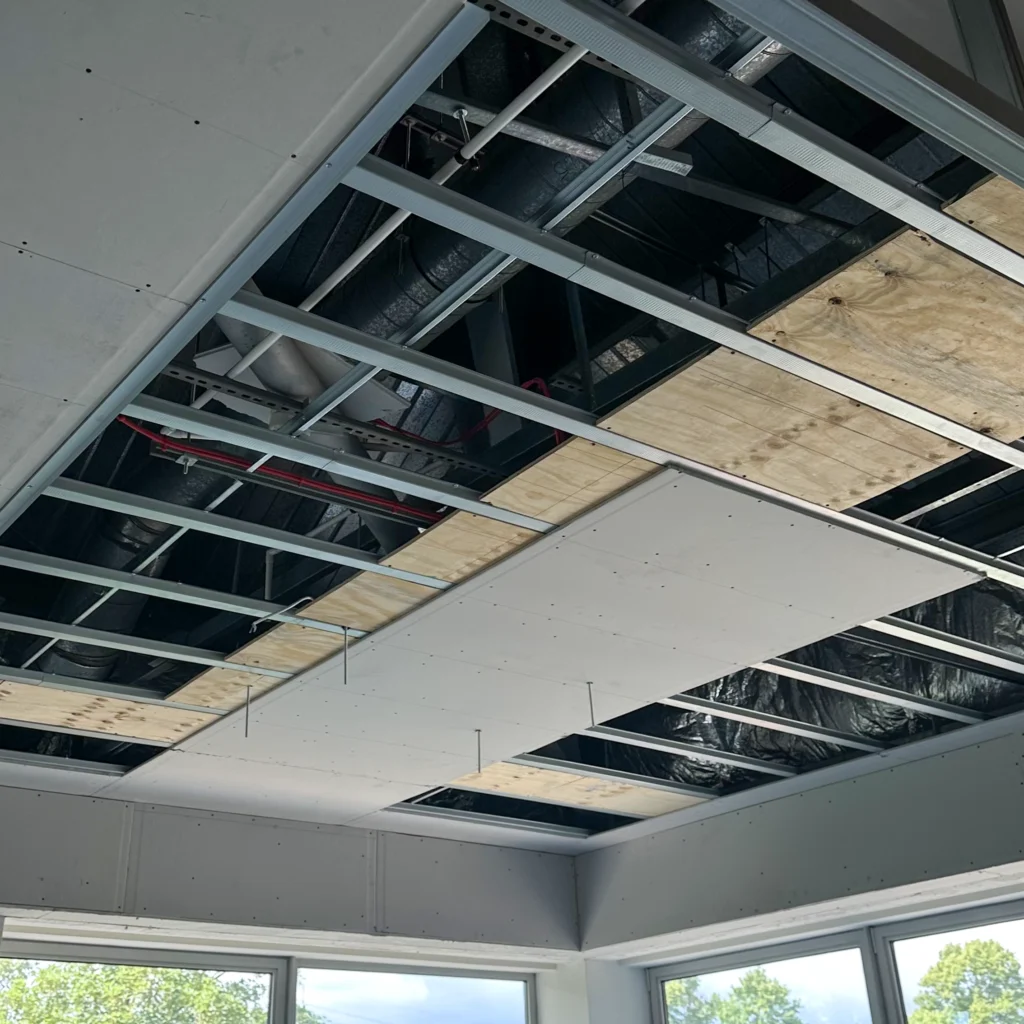 Suspended ceiling installation on a commercial fit-out project
