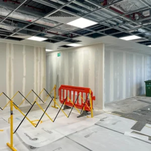 Suspended ceiling grid installation on a commercial fit-out project, set out and fixed ready for ceiling tiles

