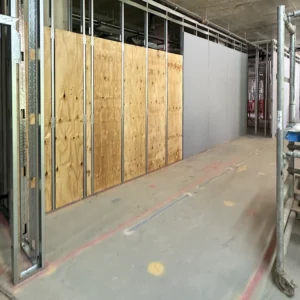 Commercial drylining partitions with fire-rated and acoustic systems