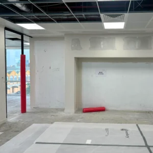 Finished drylining with tape and jointing, formed nib detail, bulkhead and an opening prepared for glazing