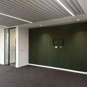 Finished commercial office interior showing ceiling detail and glazing partitions