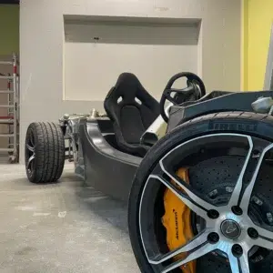 Feature wall with service riser openings formed for a large screen installation at the University of Surrey